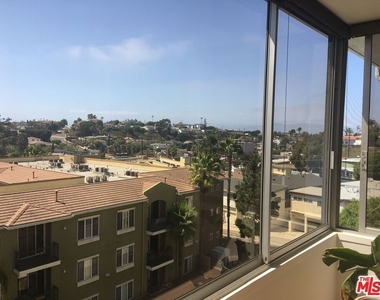 8701 Delgany Avenue - Photo Thumbnail 4