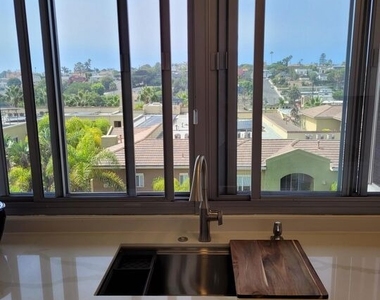 8701 Delgany Avenue - Photo Thumbnail 20