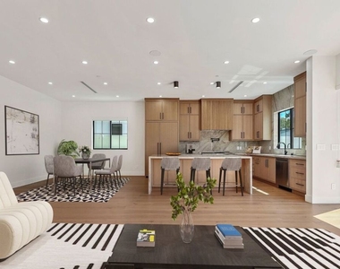 5917 Rhodes Avenue - Photo Thumbnail 6