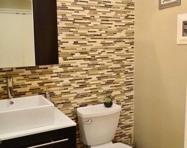1235 Neptune Ave - Photo Thumbnail 6