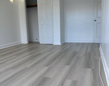 87-11 57th Avenue - Photo Thumbnail 3