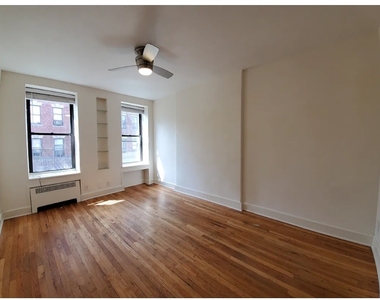 225 W 15th Street - Photo Thumbnail 1