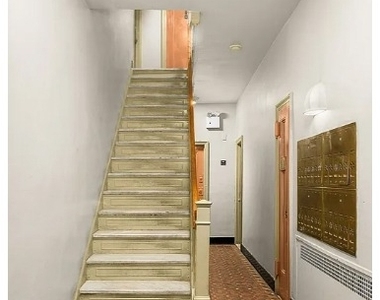 225 W 15th Street - Photo Thumbnail 6