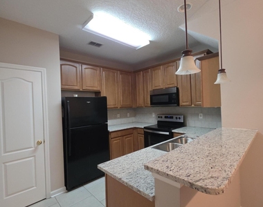 6070 Bartram Village Drive - Photo Thumbnail 4