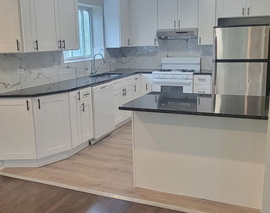 8638 Trumbull Avenue - Photo Thumbnail 2