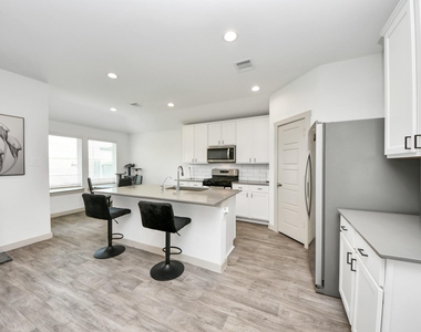 7706 Caspian Ranch Drive - Photo Thumbnail 2