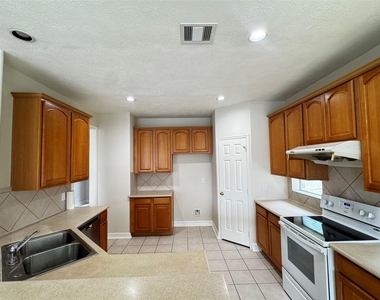3002 Flintwood Drive - Photo Thumbnail 4