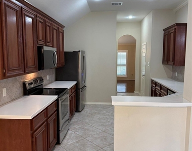6914 Sunflower Grove Drive - Photo Thumbnail 9