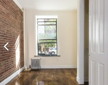 W 103rd St. - Photo Thumbnail 3