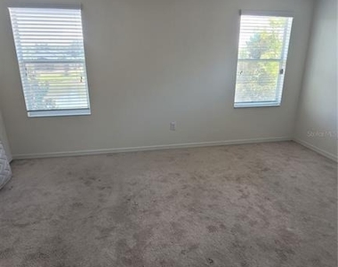 7005 Towering Spruce Drive - Photo Thumbnail 5