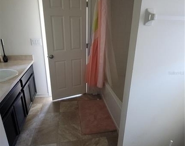 7005 Towering Spruce Drive - Photo Thumbnail 7