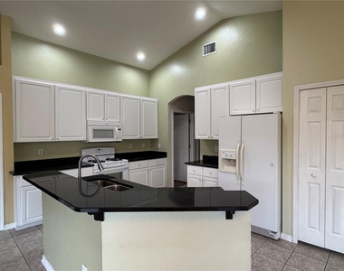 10207 Quails Landing Avenue - Photo Thumbnail 14