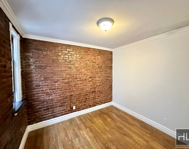 E 13th St. - Photo Thumbnail 6