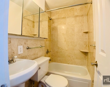 E 13th St. - Photo Thumbnail 7
