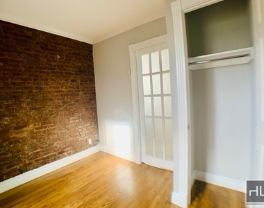 E 13th St. - Photo Thumbnail 3