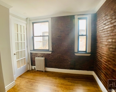 E 13th St. - Photo Thumbnail 5