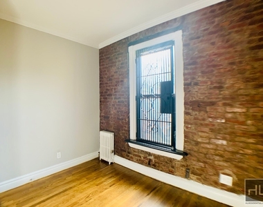 E 13th St. - Photo Thumbnail 2