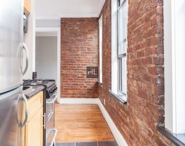E 13th St. - Photo Thumbnail 4