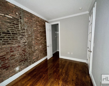 E 13th St. - Photo Thumbnail 4