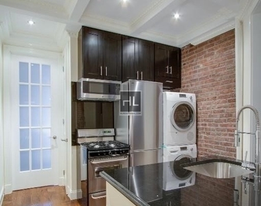 W 108th St - Photo Thumbnail 2