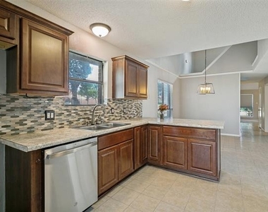 1712 E Peters Colony Road - Photo Thumbnail 4