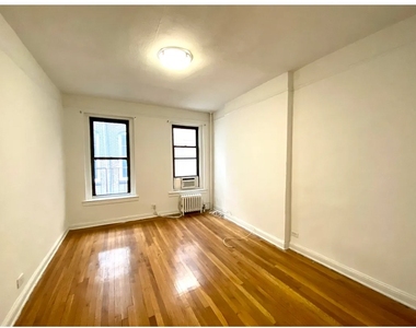 237 E 58th Street - Photo Thumbnail 1