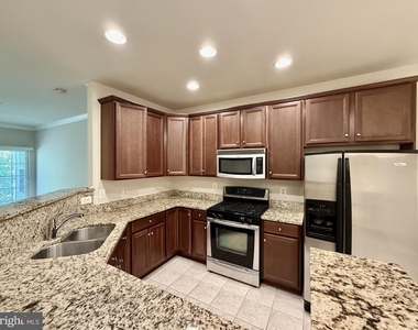 9720 Holmes Place - Photo Thumbnail 1