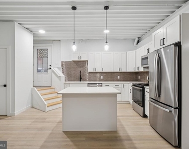 1116 N Bodine Street - Photo Thumbnail 1