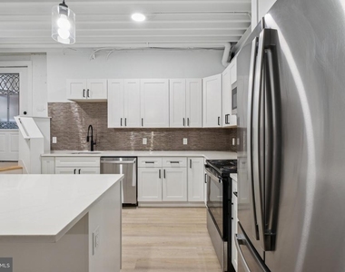 1116 N Bodine Street - Photo Thumbnail 5