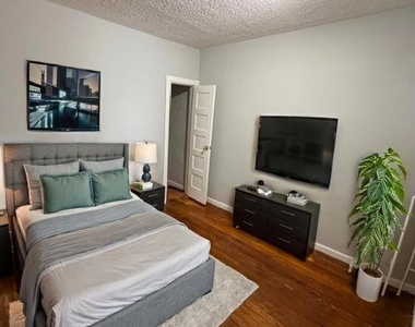 5928 N Lawrence Street - Photo Thumbnail 2