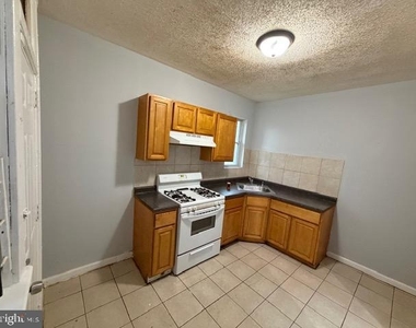 5928 N Lawrence Street - Photo Thumbnail 6