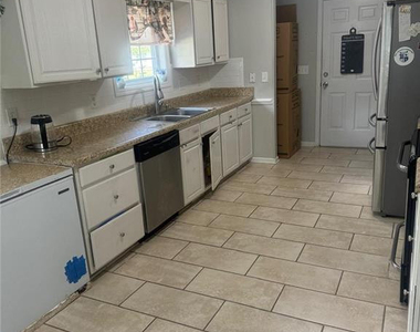 7208 Beaver Run Drive - Photo Thumbnail 2