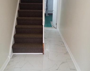 58 Suburban Lane - Photo Thumbnail 1