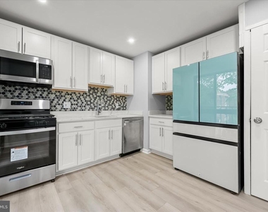 7967 Riggs Road - Photo Thumbnail 1