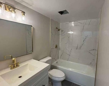 1317 Hollins Street - Photo Thumbnail 3