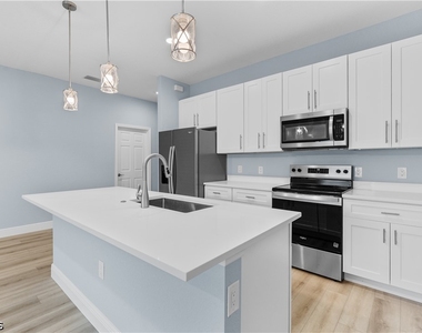1601 E 7th Street - Photo Thumbnail 3