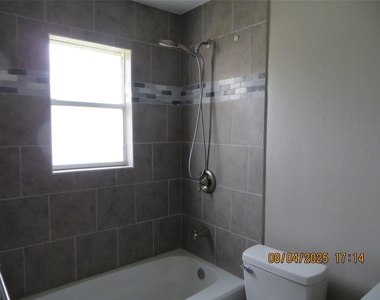 8716 Club House Drive - Photo Thumbnail 5