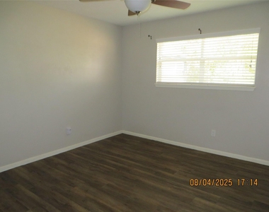 8716 Club House Drive - Photo Thumbnail 3
