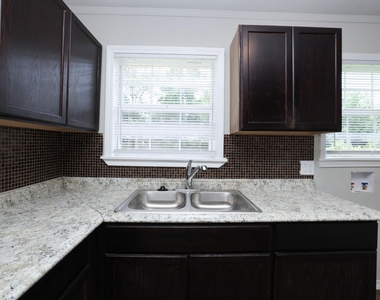 9026 Lake Forest Boulevard - Photo Thumbnail 17