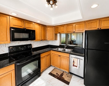 2616 Cove Cay Drive - Photo Thumbnail 3