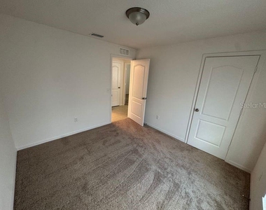 6909 Crested Orchid Drive - Photo Thumbnail 10