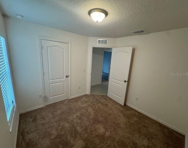 6909 Crested Orchid Drive - Photo Thumbnail 14