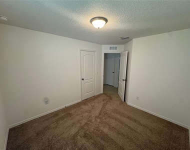 6909 Crested Orchid Drive - Photo Thumbnail 8