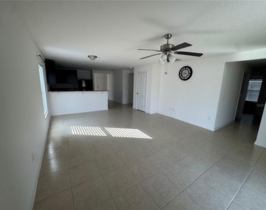 6909 Crested Orchid Drive - Photo Thumbnail 5