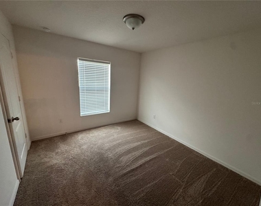6909 Crested Orchid Drive - Photo Thumbnail 9