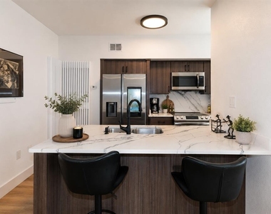 4704 Chevy Place - Photo Thumbnail 5