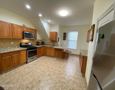 95 Cooper Avenue - Photo Thumbnail 1