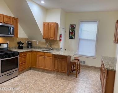 95 Cooper Avenue - Photo Thumbnail 2