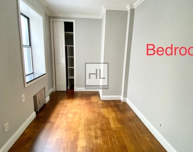 E 100th St - Photo Thumbnail 4