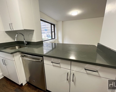 East 56 Street - Photo Thumbnail 1
